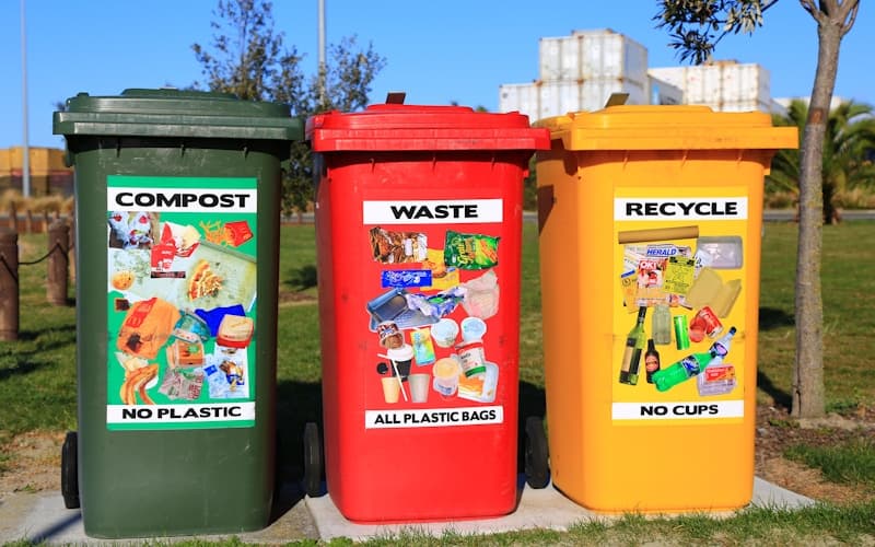 Segregated recyclable materials and sorted metals awaiting processing at a licensed Dubai recycling plant